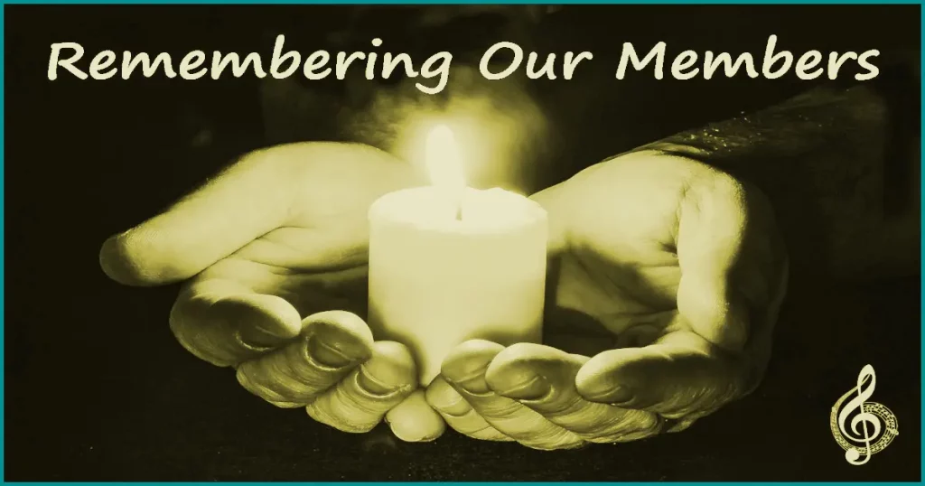 Cupped hands holding a lit candle with the words "Remembering Our Members"