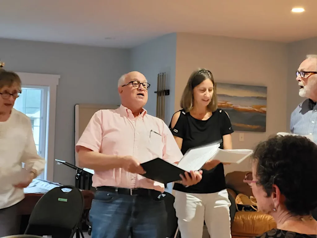 Doug, Sue, Leo, and Joan (AKA: The Carpool Quartet) Singing "Sunny Side...Sorta" at the 2024 closing party